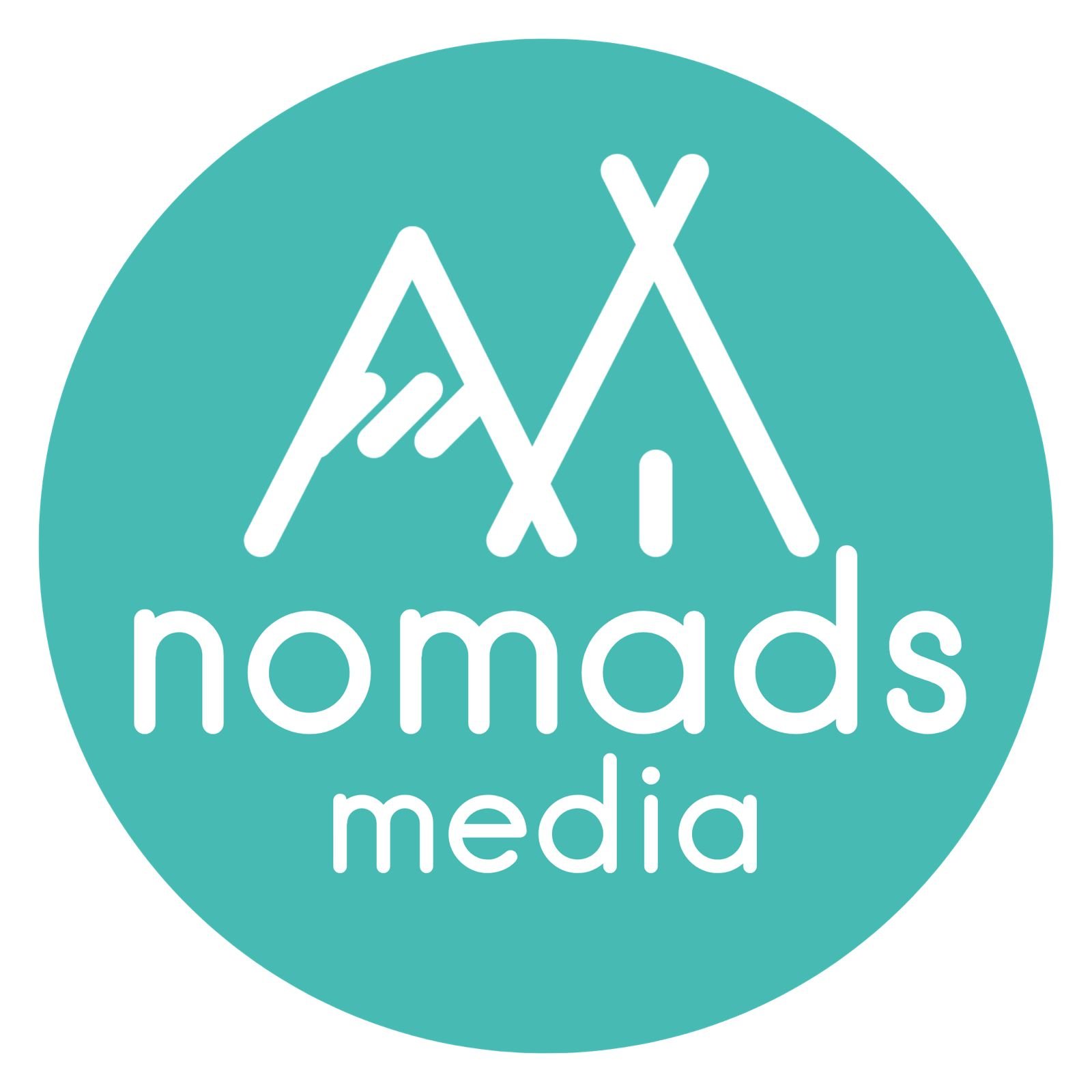 Nomads Media logo — official media partner of Alicante Tech Vibes